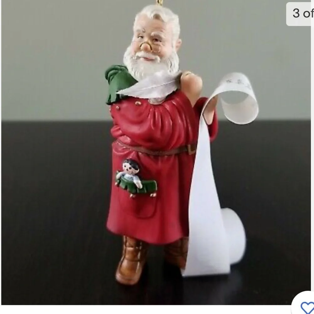 HALLMARK ORNAMENT CHECKING THE LIST 2002